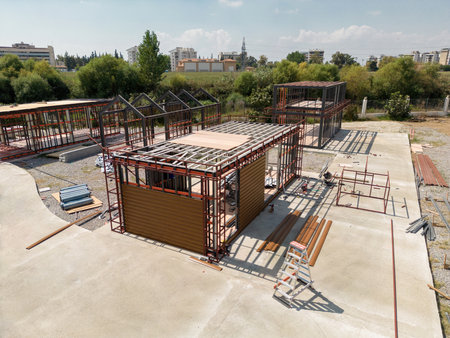 Metal frame of newly built building. Construction of a new tiny house