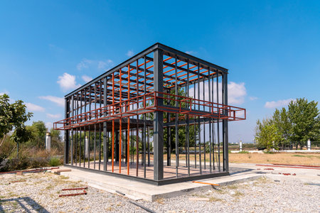 Metal frame of newly built building. Construction of a new tiny house