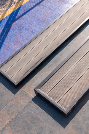Seating area for spectators made with composite deck next to the tennis courtの写真素材