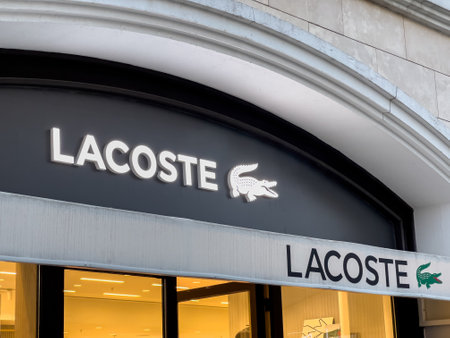 Antalya, Turkey - November 29, 2022: Illuminated logo of Lacoste store in Antalya Turkeyのeditorial素材