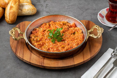 Traditional turkish breakfast food menemen made by eggs and tomatoesの写真素材