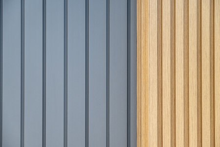 Wooden textured and anthracite gray vinyl coated exterior insulation board on PVC panel
