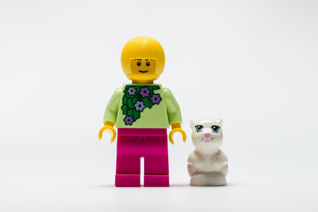 Antalya, Turkey - August 22, 2023: Traveler Lego female character on white background