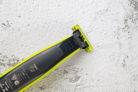 Antalya, Turkey - August 31, 2023: Top view of the dry and wet rechargeable Philips OneBlade shaver