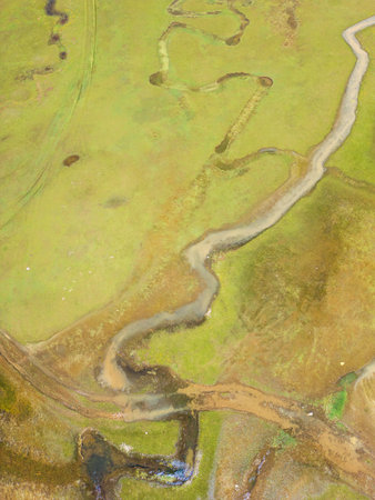 The meander in Antalya Sobucimen plateau. Aerial view of complex waterways weaving through lush...