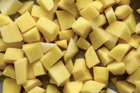Top view of potatoes being chosen for fryingの写真素材