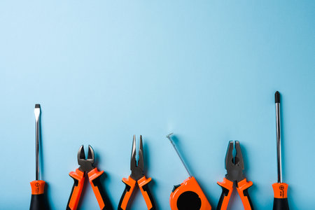 Handled tools or construction tools on blue background