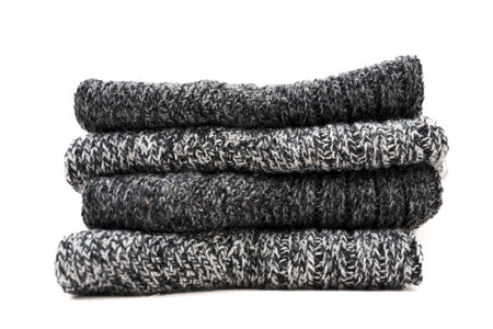 Top view of gray woolen winter socks on white backgroundの写真素材