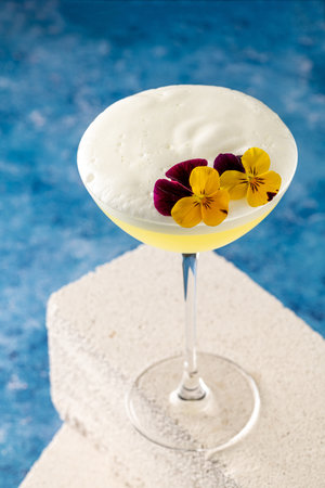 Elegant cocktail in front of dark backgroundの写真素材