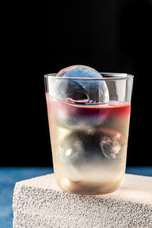 Elegant luxury cocktail in front of dark background