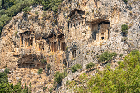 Ancient Lycian rock tombs of Kaunos carved into cliffs in Dalyan, Turkeyの写真素材