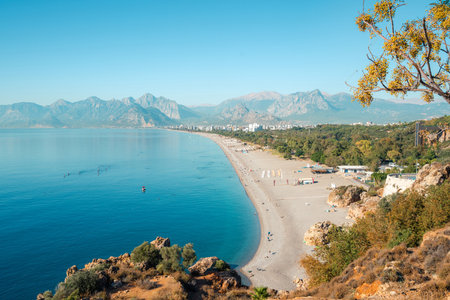 Aerial view of Konyaalti beach and pine-covered coastline at sunrise in Antalyaの写真素材