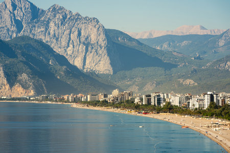 Aerial view of Konyaalti beach and pine-covered coastline at sunrise in Antalyaの写真素材