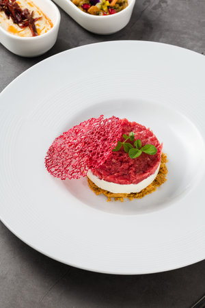 Modern plated dessert served with artistic presentation