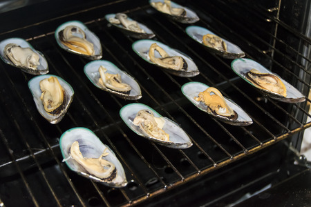 Mussels in the oven black background