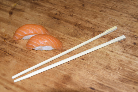 salmon nigiri sushi on  wooden backgroundの写真素材