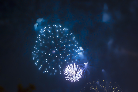blue bright blurred fireworks effect abstract colorful background holiday celebration
Â の写真素材
