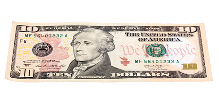 10 dollars banknote stacked end isolated on white background, made at an angle.