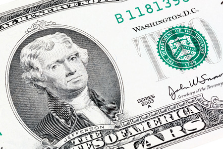 Close-up portrait of President Jefferson end print department of the treasury on two dollars bill. Stacked shotの写真素材