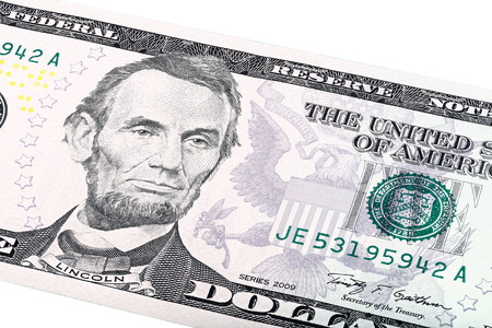 Close-up portrait of Abraham Lincoln end print of department of the treasury on five-dollar bill.の写真素材