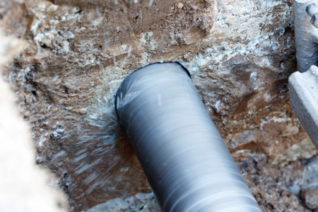 Diamond drilling in concrete. Close-up photo.
