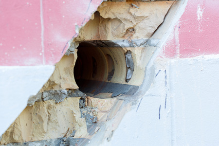 Drilling holes in concrete wall.の写真素材