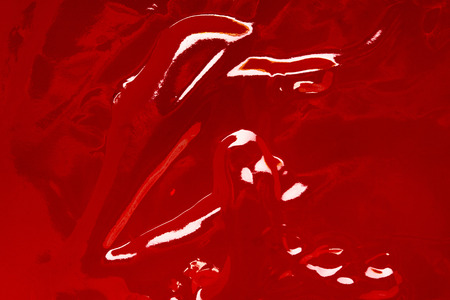 Orange waves of sweet organic jam. Abstract background.の写真素材