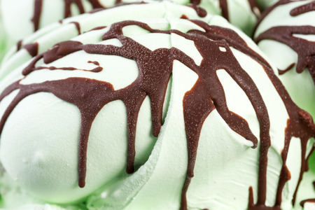 Close up of poured by chocolate green ice-creamの写真素材