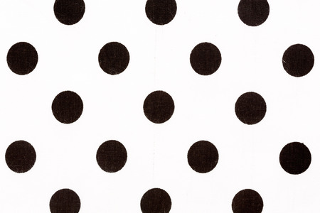 Black polka dot over white fabric background and texture, High qualityの写真素材