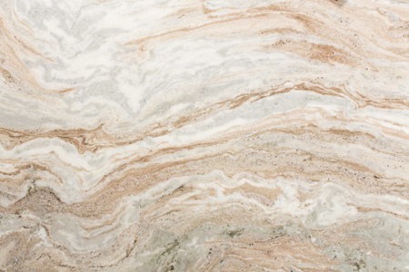 Light brown quartzite stone surface. High resolution photo.