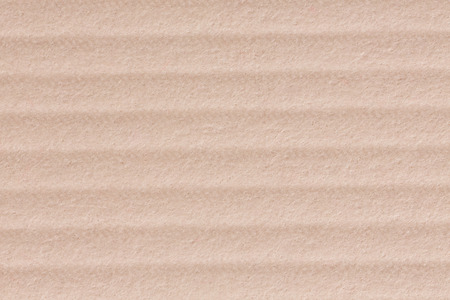 Close up of brown paper box sheet abstract texture background. High resolution photo.