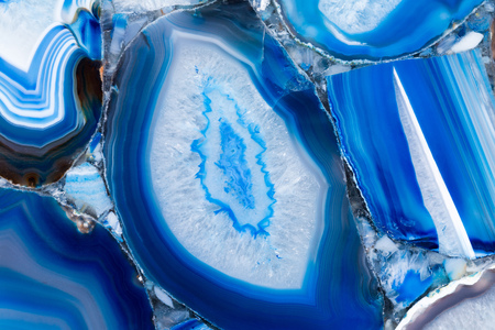 Amazing agat texture with contrast surface in blue tone. High resolution photo.
