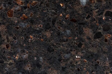 Dark synthetic stone background with stylish surface.