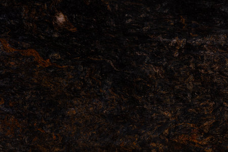 Metalicus - natural polished black, orange granite stone slab, texture for perfect interior or other design project.の写真素材