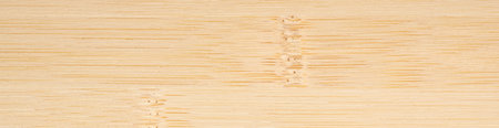 Textured wood grain background with bamboo beige pattern and copy space. Panoramic wood veneer texture.の写真素材