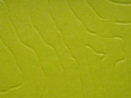 Lime zest paper waves creating a dynamic texture thats lively and full of motion