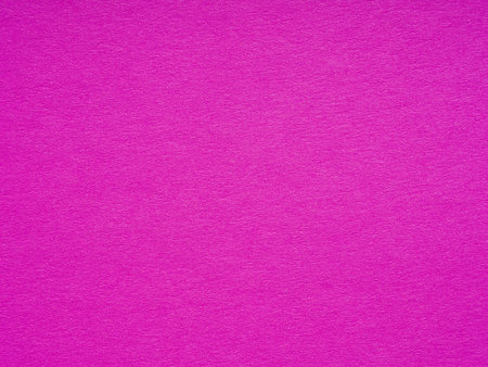 The vibrant fuchsia texture of the paper ignites creativity, signaling bold ideas and playful imaginationの写真素材