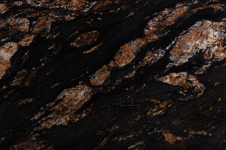 Natural Black Magma granite texture, strict background in dark color.の写真素材