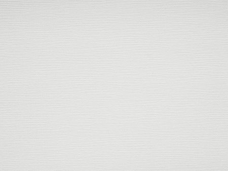 The warm white texture of the paper whispers tales of blank canvases and silent masterpieces awaiting creationの写真素材