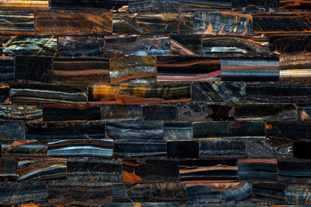 Tiger Eye Blue slab. Semi precious dark pattern. Exclusive luxury gemstone background. Polished semiprecious stone for ceramic wall and floor digital tiles. Precious mineral quartz pattern.の写真素材