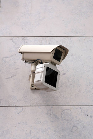 surveillance camera on a buildingの写真素材