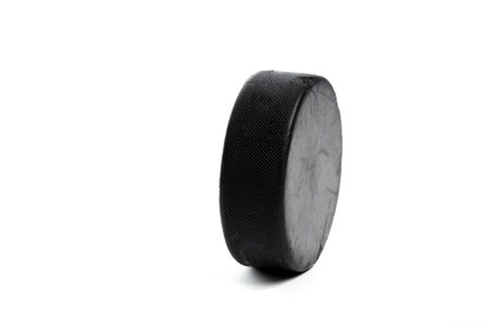 hockey puck on whiteの写真素材