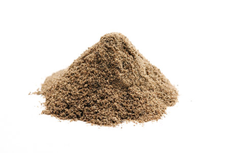 ground black pepper on whiteの写真素材