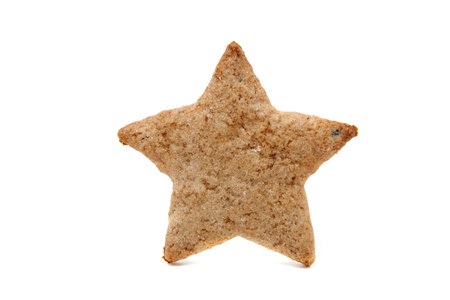 star shaped gingerbread cookie on whiteの写真素材
