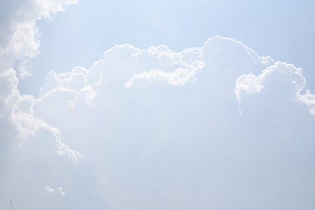 fluffy clouds in blue sky