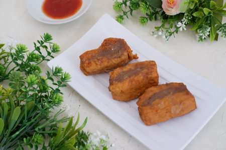 Fried tofu filled with delicious meatの写真素材