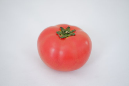 Tomato isolated on white background. Red tomato on white background.の写真素材