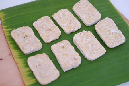 Cereal bars on banana leaf background. Healthy snack and snack.の写真素材