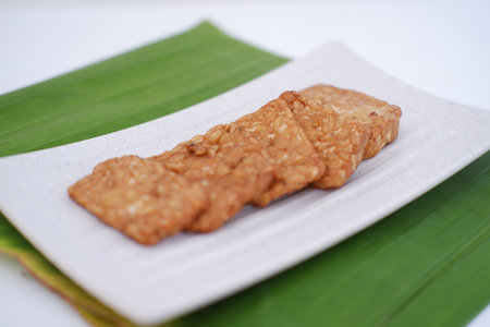 Thai sweetmeat made from glutinous rice and fried pork.の写真素材