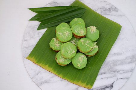 Pandan flavored cake with beautiful green leavesの写真素材